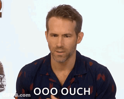 Man In Blue Shirt Saying Ouch GIF