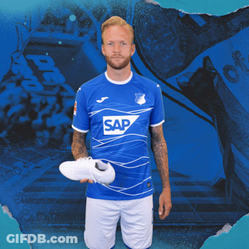 Man In Blue Shirt Saying Sap Holding White Shoe GIF