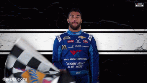Man In Blue Shirt Saying Silicon Valley In St. Louis Holding Checkered Flag GIF