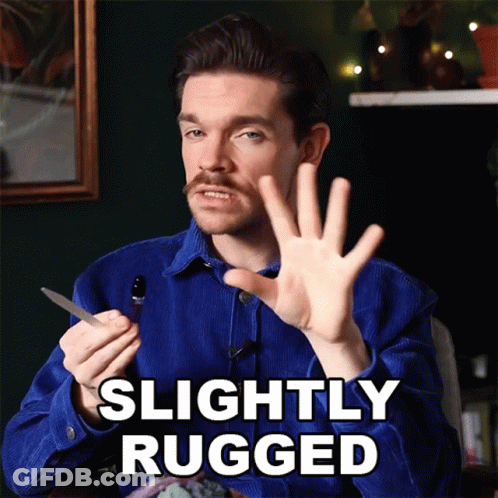 Man In Blue Shirt Saying Slightly Rugged GIF