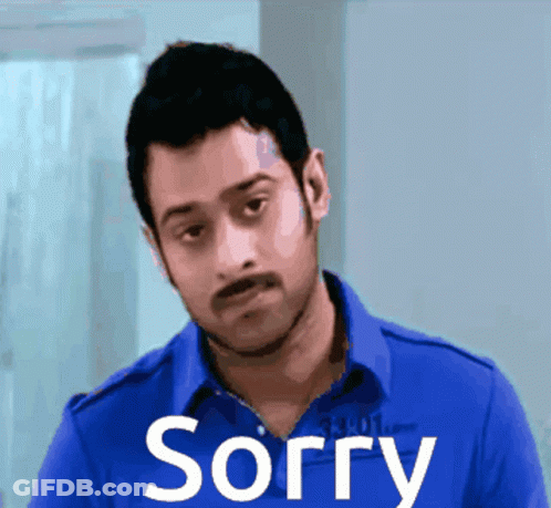 Man In Blue Shirt Saying Sorry GIF