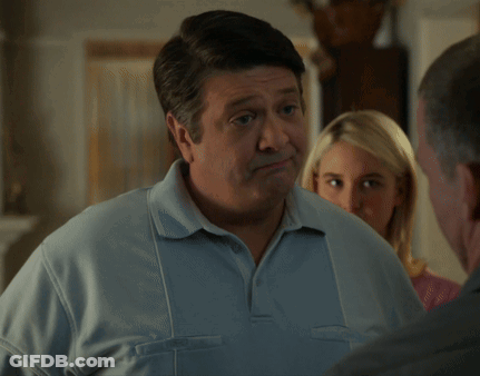 Man In Blue Shirt Saying Sure Why Not GIF