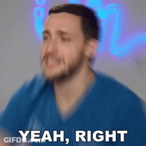 Man In Blue Shirt Saying Yeah Right GIF