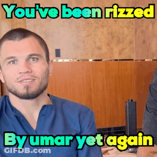 Man In Blue Shirt Saying You've Been Rizzed By Umar Yet Again GIF
