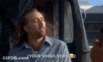 Man In Blue Shirt Saying Your Shoulders In Truck GIF