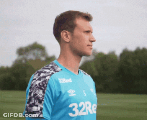 Man In Blue Shirt Says 32Re GIF