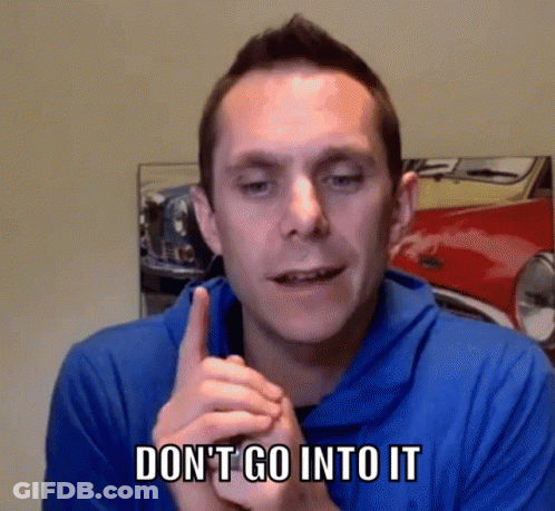 Man In Blue Shirt Says Don't Go Into It In Front Of Red Car GIF