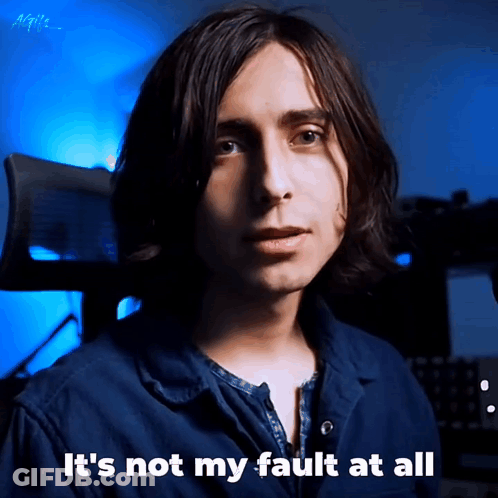 Man In Blue Shirt Says It's Not My Fault At All GIF