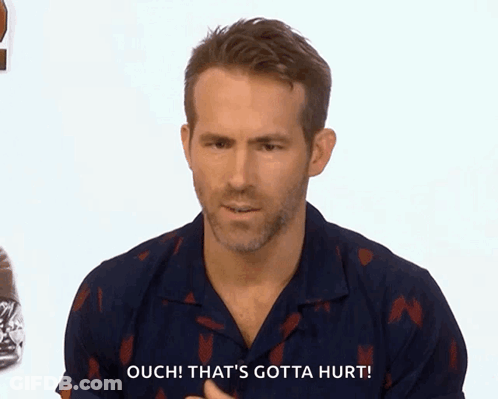 Man In Blue Shirt Says Ouch GIF