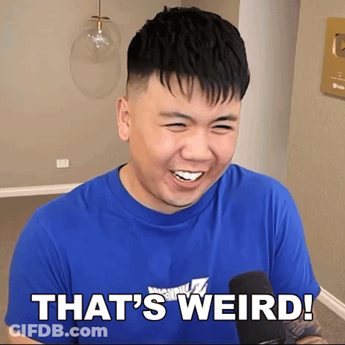 Man In Blue Shirt Says That's Weird At Microphone GIF