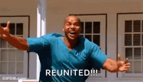 Man In Blue Shirt Shouting With Arms Outstretched GIF