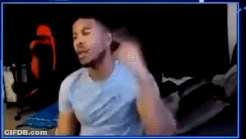 Man In Blue Shirt Sitting At Computer GIF