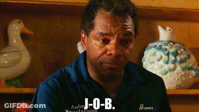 Man In Blue Shirt Sitting By Shelf With Duck And Chicken GIF
