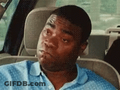 Man In Blue Shirt Sitting In Back Seat Eyes Closed GIF