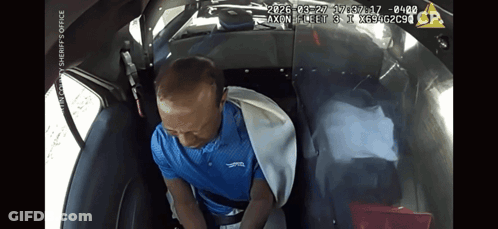Man In Blue Shirt Sitting In Car GIF