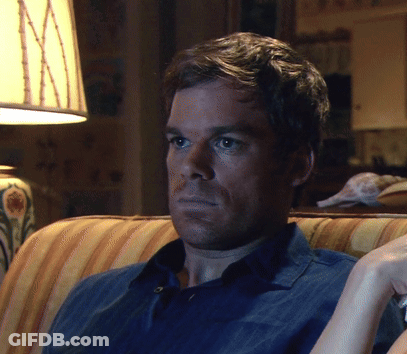 Man In Blue Shirt Sitting On Couch GIF