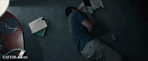 Man In Blue Shirt Sitting With Big Short GIF