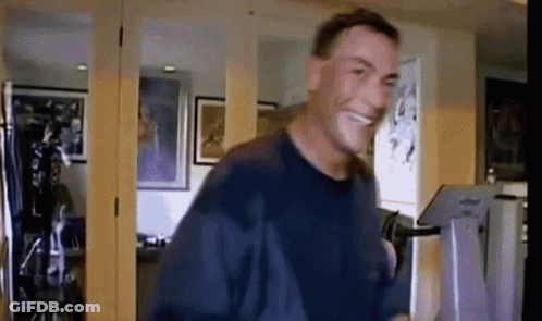Man In Blue Shirt Smiling And Dancing GIF