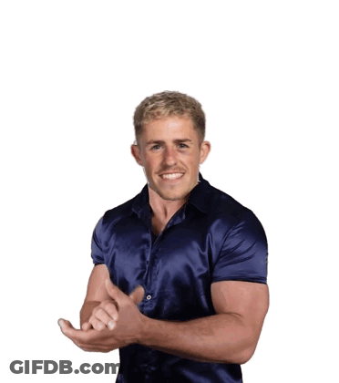 Man In Blue Shirt Smiling And Gesturing GIF