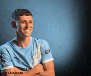 Man In Blue Shirt Smiling Arms Crossed GIF