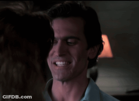 Man In Blue Shirt Smiling At Woman GIF