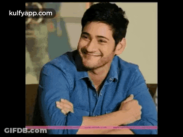 Man In Blue Shirt Smiling Crossed Arms GIF