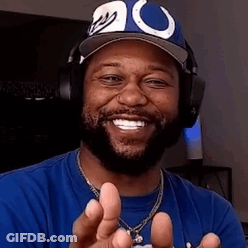 Man In Blue Shirt Smiling Peace Sign GIF