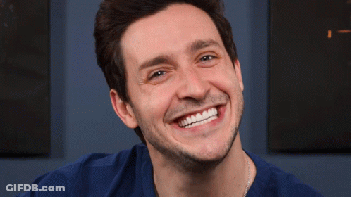 Man In Blue Shirt Smiling GIF