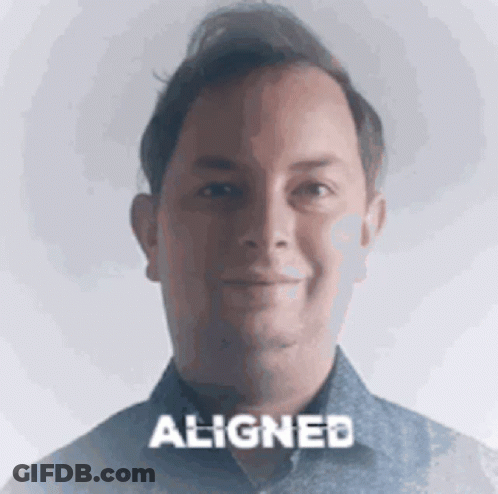 Man In Blue Shirt Smiling Word Aligned GIF