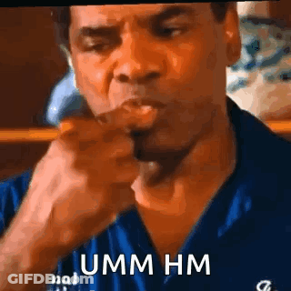 Man In Blue Shirt Smoking And Pointing GIF