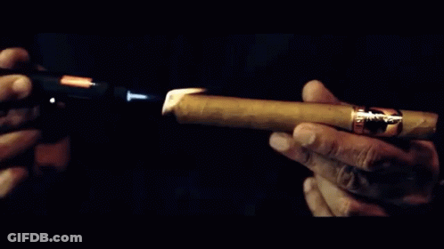Man In Blue Shirt Smoking Cigar With Cigar Zeet GIF