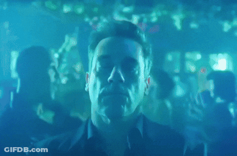 Man In Blue Shirt Standing GIF