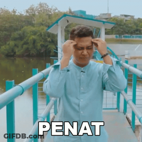 Man In Blue Shirt Standing On Bridge Saying Penat GIF