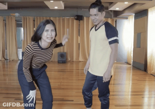 Man In Blue Shirt Swinging Tennis Racquet Steve Furgals Banner GIF