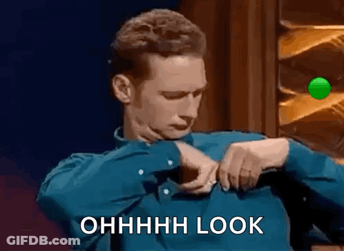 Man In Blue Shirt Taking Off Shirt GIF