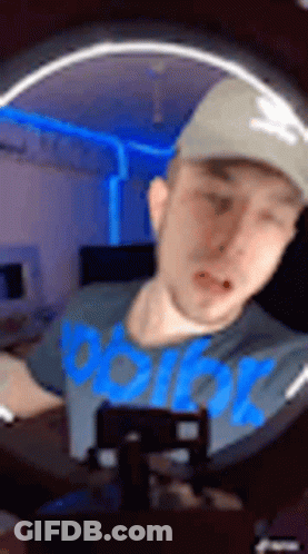 Man In Blue Shirt Taking Selfie GIF