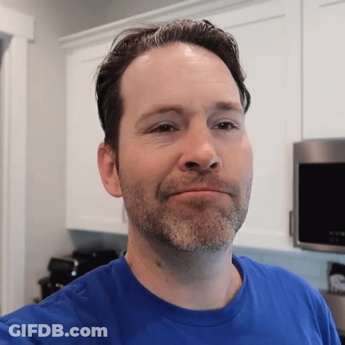 Man In Blue Shirt Taking Selfie GIF