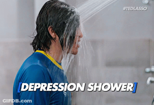 Man In Blue Shirt Taking Shower GIF