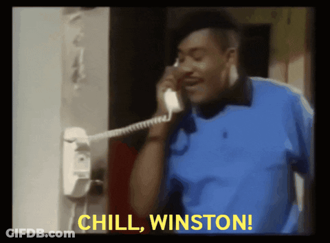 Man In Blue Shirt Talking On Phone Chill Winston GIF