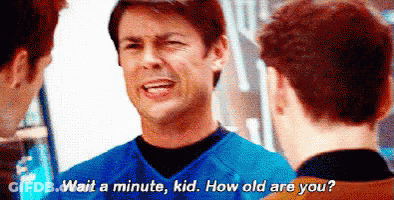 Man In Blue Shirt Talking To Another Man GIF