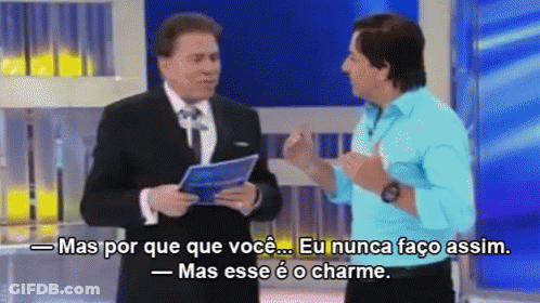 Man In Blue Shirt Talking To Man In Black Suit GIF