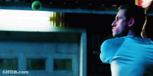 Man In Blue Shirt Throwing Ball GIF