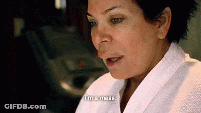 Man In Blue Shirt, Tie, And TMC Bricks GIF