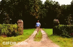 Man In Blue Shirt Walking GIF