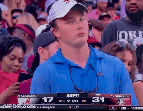 Man In Blue Shirt Watching Game On ESPN GIF