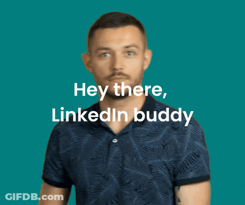 Man In Blue Shirt Waving Hey There GIF