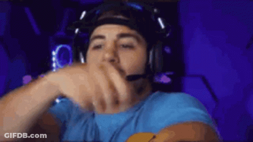 Man In Blue Shirt Wearing Headphones GIF
