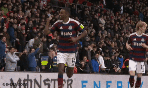 Man In Blue Shirt With Airways Standing On Soccer Field GIF