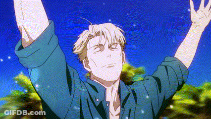 Man In Blue Shirt With Arms Outstretched In Front Of Palm Tree GIF