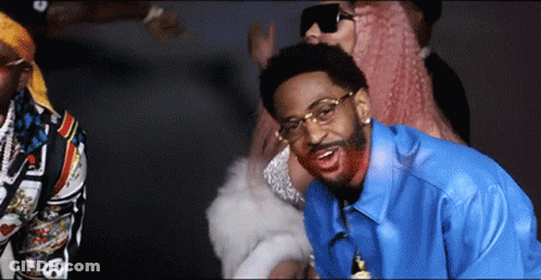 Man In Blue Shirt With Beard And Glasses Smiling GIF